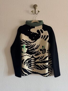 Graphic Black & Cream Turtleneck Sweater with Green Accents